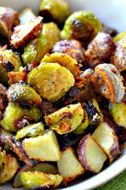 It's better to use two pans, arranged on separate racks near the middle of the oven, than to cram too many sprouts on. Parmesan Roasted Potatoes And Brussels Sprouts Small Town Woman