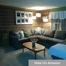 Pale grey bed linen, white floor, white floor lamp, black square bedside table. Top 10 Best Floor Lamps Of 2021 Buyer S Guide Reviews