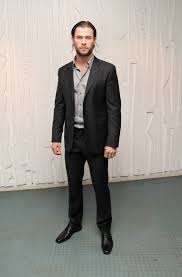 Also, it can be seen that almost every punk rocker loves to a high and tight bun is a hairstyle that suits any occasion. Chris Hemsworth Men S Suit Chris Hemsworth Suits Looks Stylebistro