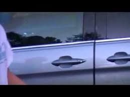 Make a hole in the tennis ball, place it over the keyhole, and push. Unlocking A Car Door With A Tennis Ball Youtube