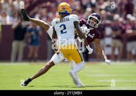 Texas A&M wide receiver Noah Thomas (3) catches a pass as McNeese State  defensive back Levi Wyatt (2) defends during the first quarter of an NCAA  college football game Saturday, Sept. 7,