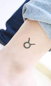 Minimalist Taurus Zodiac Symbol Tattoo On The Ankle Taurus Tattoos Tattoos Cute Ankle Tattoos
