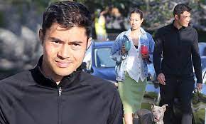 A remarkable actor, model and tv host henry golding was welcomed in malaysia in 1987. Henry Golding And His Wife Liv Lo Step Out For An Evening Stroll With Their New Foster Dog Stella Daily Mail Online