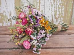 Traditionally most wedding bouquets are consisted of white and cream flowers but feel free to choose whatever color you like. Our Field Flower Bridesmaid Dried Flower Bouquet By Theflowerpatch Bridesmaid Flowers Diy Wedding Flowers Purple Wedding Bouquets