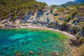 It extends almost 2 km of clear white sand and sparkling water. The 7 Prettiest Beaches In Mallorca Heart My Backpack