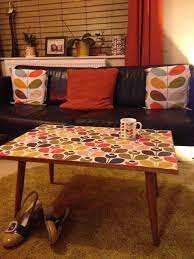 Birdhouses hang up high with 3 dimensional birds by umbra flying towards them. My New Table Given An Orla Kiely Makeover By Me Revamp Furniture Wall Decor Living Room Furniture Makeover