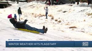 Winter Weather Brings Visitors To Flagstaff 22, 2021 in flagstaff, az. winter weather brings visitors to flagstaff