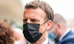 Video of the incident shows macron, dressed in a white dress shirt, extending his arm toward a man dressed in a green shirt. Lppw8jyzpllv6m