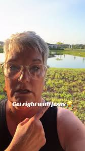 Man Feeding Gator Chicken Leg