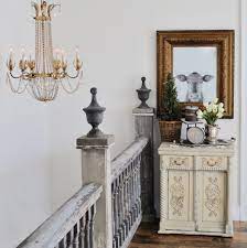 However, because the homeowner either used different wood species or stained them all differently, it doesn't feel like its overrun by wood in the design. Farmhouse Stair Railing Ideas And Inspiration Hunker