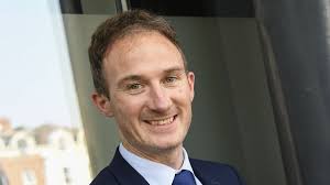 Minister Alan Dillon