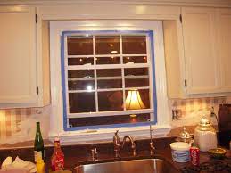 Create the illusion of windows by lauren flanagan has more than 15 years of experience working in home decor and has written in a kitchen or bathroom, add a mirror the size of a window across from your sink, then. Above Kitchen Sink Decor