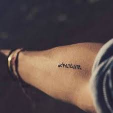 40 Minimalist One Word Tattoo Ideas That Are Beautiful On Every Woman Wanderlust Tattoos One Word Tattoo Discreet Tattoos