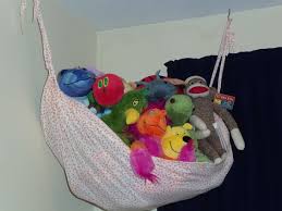 When i first think of stuffed animal storage the first thing i think of is a stuffed animal hammock, or pet net as they are sometimes called. 12 Diys To Make A Stuffed Animal Hammock Guide Patterns