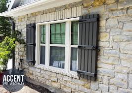 In this case the windows have plenty of white trim so the color scheme for the exterior is red, dark gray and white. Get The Protection Cover For Your Windows By Using Outdoor Shutters Decorifusta