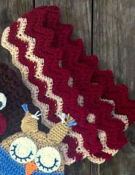 The feather and fan pattern gives it a wavy look and lacy knit. Ravelry Bacon Strip Scarf Pattern By Kandace Green