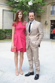 He is a male celebrity. Stefano Accorsi And Girlfriend Bianca Vitali At The Valentino Spring Summer 2015 Menswear Show In Paris The 25 Fashion Celebrity Fashion Trends Fashion Trends