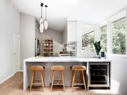 Same style cupboards as kitchen but in another colour. How To Squeeze In A Wine Fridge At Home Houzz Au