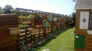 cloture et jardinieres en palettes guide astuces backyard fences fence planters fence planning