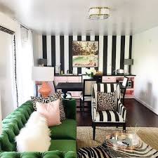 Black And White Striped Desk Chair This Wallpaper Chic Office Boasts A Black And White Striped Accent Wall Lined With Pink Cabinets And Black Countertops Lit By A Clover Flush Mount Nilgun Striped Wallpaper Living Room