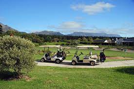 Golf Carts Against Backdrop Of Cape Town Golf Course In The Background Table M Sponsored Ad Ad Carts Cape Background Golf Carts Golf Golf Courses