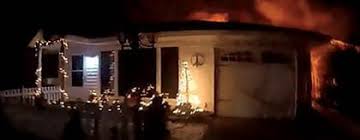 Woman rescued from burning New Buffalo home