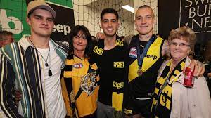 Dustin martin's first senior coach jamie elliott marvels at richmond superstar's grand final heroics dustin martin's afl career reaching new heights nan lois pins hopes on more dusty magic mum. The Tackle Inside Richmond S Black And Yellow Euphoria Queensland Times
