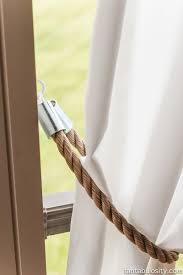 Curtains, despite having competition in the form of blinds and shutters, are still the most fashionable decorative element of the window. Diy Patio Curtain Tie Backs For 5 00 Rustic Nautical