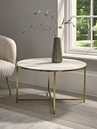 The smaller table fits perfectly under the larger table for a sleek and endlessly versatile look that only a great set of nesting tables can offer. New Marble Effect Coffee Table New This Season Marble Marbledecor Marblehomedecor Marblecoffeetable Ma Luxury Coffee Table Coffee Table Coffee Tables Uk