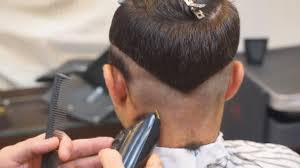 While you may not want your barber to write your girlfriend's name in your hair, v haircuts offer the perfect balance. Close Up Of Men Haircut With Clipper In The Barbershop Haircut Men Barbershop Men Hairdressers Barber Cuts The Client Machine For Haircuts Video By C Shain55 Stock Footage 189729288
