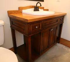 The bath house is complete with showers and restroom facilities at the hot springs. Hand Crafted Custom Wood Bath Vanity With Reclaimed Sink By Moss Farm Designs Custommade Com