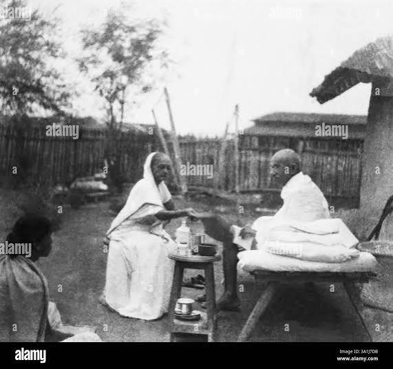 Mahatma Gandhi in front of his hut in Sevagram Ashram at Wardha, Maharashtra, India, Asia, old vintage 1900s picture Stock Photo - Alamy