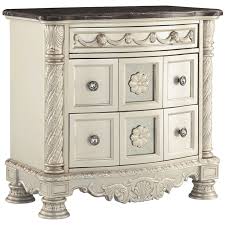 The scratches, dents, broken drawers, drawes not gliding in and out properly. Ashley Cassimore 3 Drawer Marble Top Nightstand In Pearl And Brown