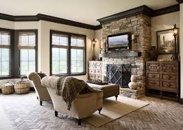 Well Done Tuscan Color Scheme Light Colored Taupe Walls Accented By Dark Trim And Stone Work Living Room Wood Floor Home Living Room Paint