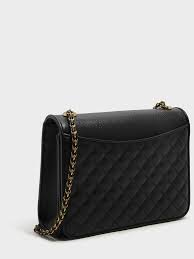 Looking for the best charles & keith handbags? Black Quilted Sling Bag Charles Keith In