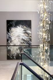 Luxury Gallery Landing Allowing Light To Flow Through The Glass Balustrades With A Bespoke Leat Luxury Chandelier Hand Blown Glass Chandelier Interior Lighting