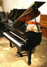 Black Baby Grand Piano Used A Brand New Steinhoven Model 148 Baby Grand Piano With A Black Case And Piano For Sale Baby Grand Pianos Piano