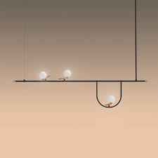 The Yanzi Linear Suspension Offers A Sharp Modern Look With A Touch Of Whimsy That Is Sure To Be A Unique Kitchen Island Pendants Light Track Lighting Kitchen