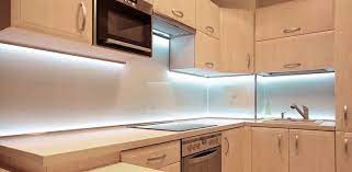 Hold the fixture against the underside of the cabinet, then slide it forward until it's hidden behind the cabinet's front edge. How To Install Led Under Cabinet Lighting Kitchen Lighting Led Light Guides