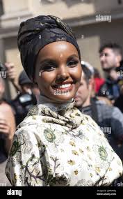 File photo dated September 20, 2019 of Halima Aden attends Etro fashion  show during Milan Fashion Week in Milan, Italy. American model Halima Aden  says she is quitting runway modelling as it