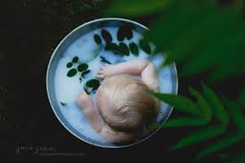 Milk baths will also soften your skin. Sara Zinn Photography Baby Hal Milk Bath Session