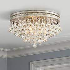 This round crystal flushmount is the perfect light to accent your home and brighten up your space in a luxurious fashion! Crystal Flush Mount Lighting Lamps Plus