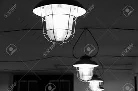 Round Protected Industrial Lighting On Ceiling In Dark Stock Photo Picture And Royalty Free Image Image 88718903