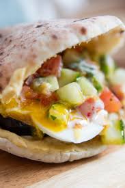 Sabich Sandwiches Pitas With Eggplant Eggs Hummus And Tahini Recipe With Images Recipes Tahini Recipe Whole Food Recipes