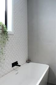 It is essential to note that all bathroom features must withstand wet and humid conditions. White Fish Scale Tile White Tile Bathroom Feature Wall Large White Fish Scale Tile Bathroom Wall Tile Bathroom Feature Wall Tile Bathroom