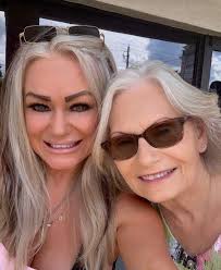 Melanie's Cutting Edge added a...