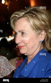 Sen. Hillary Rodham Clinton (D-NY) and the President of the Apollo Alliance Jerome  Ringo arrive for the start of the Apollo Alliance luncheon in Washington