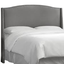 The upholstered headboard showcases clean and elegant lines with tufted buttons for added charm. Best Upholstered Headboards For Comfort