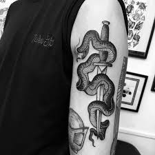 Snake tattoos ideas & designs. 50 Snake Dagger Tattoo Ideas For Men Sharp Serpent Designs