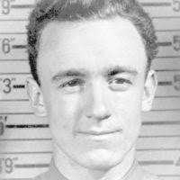 World War II (WWII) area photograph of US Marine Corps (USMC) Major (MAJ),  John L. Smith, taken February 1943. MAJ Smith was awarded the Medal of  Honor and is an Ace Pilot